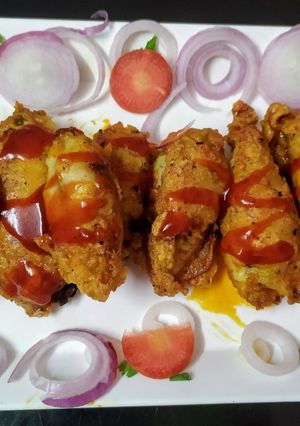A picture of Chicken stuffed squid.