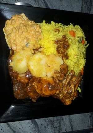 A picture of Potatoes and chicken meal.