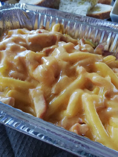 Una foto de Patatas cheddar y bacon