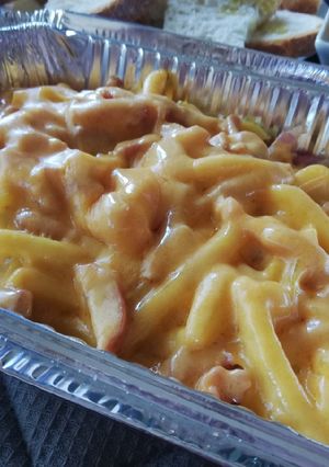 Una foto de Patatas cheddar y bacon