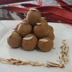Besan laddo with gud powder A picture of Besan laddo with gud powder.