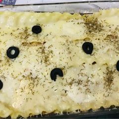 A picture of Lasagna with meat sauce.