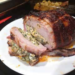 A picture of Smoked Bacon Wrapped Stuffed Pork Loin Roast.