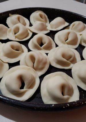 Una foto de Agnolotis de jamón y queso