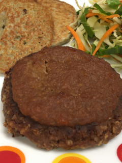 A picture of Umami Explosion Plant-based Hamburger with Apple Chutney.