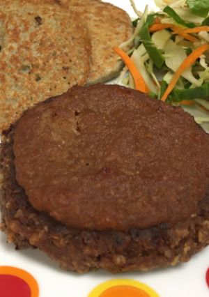A picture of Umami Explosion Plant-based Hamburger with Apple Chutney.