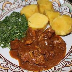 A picture of Sweet potatoes,Beef Stew and veggies.