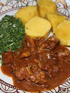 A picture of Sweet potatoes,Beef Stew and veggies.