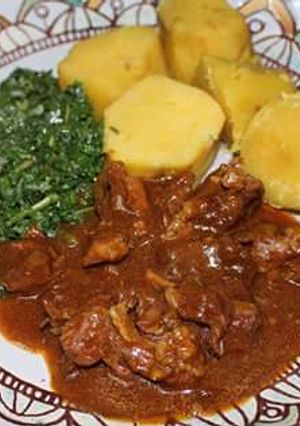 A picture of Sweet potatoes,Beef Stew and veggies.
