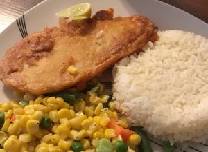 Una foto de Tilapia capeada