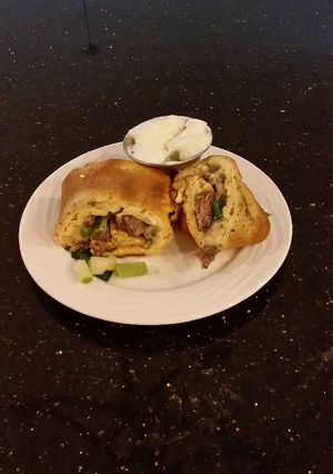 A picture of Steak and Cheese Rolled Baked Omlet.