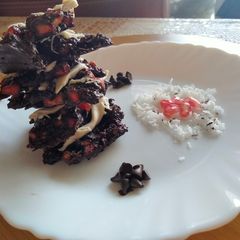 A picture of Pomegranate and coconut flakes Dark chocolate bark.