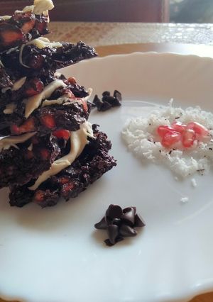 A picture of Pomegranate and coconut flakes Dark chocolate bark.