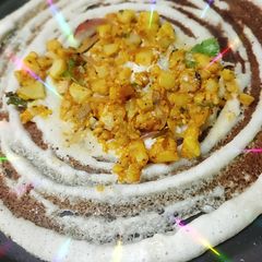 A picture of Masala Dosa, sambar, coconut, dhania chutney.