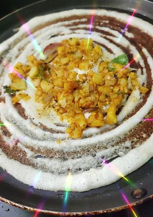 A picture of Masala Dosa, sambar, coconut, dhania chutney.