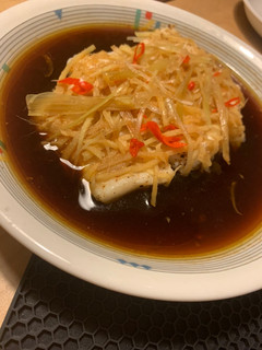 A picture of Asian steamed fish.