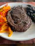 Bistec al horno de leña