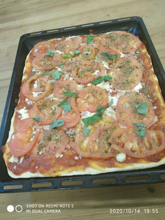 Una foto de Pizza margarita