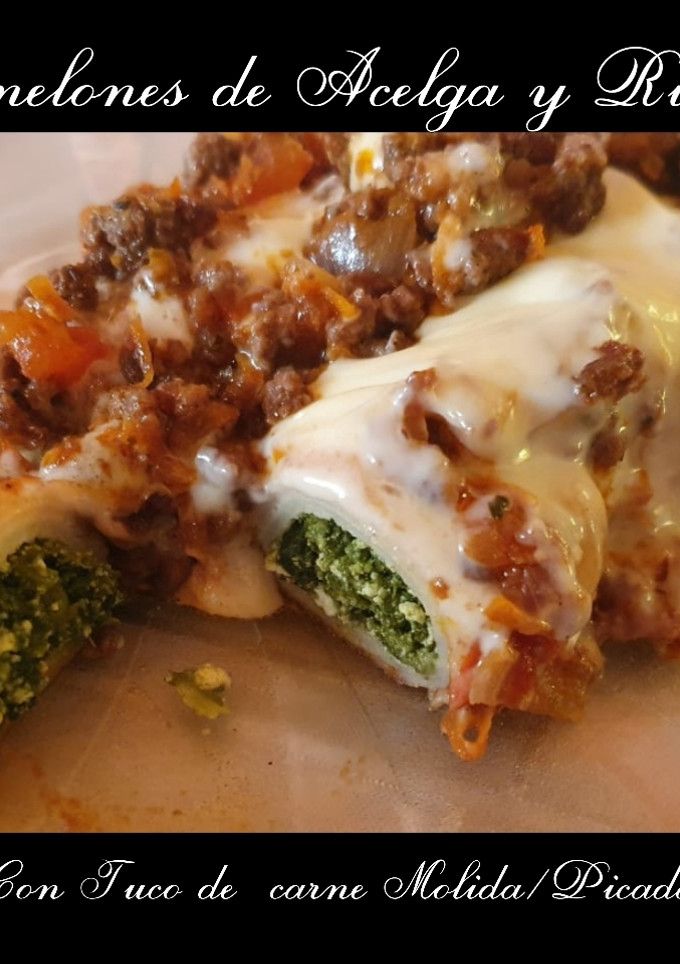 Una foto de Canelones de acelga y Ricota Con tuco de carne molida/picada 👌