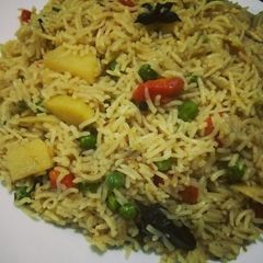 A picture of Vegetable Pulao💚💛💚.