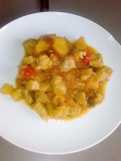 Una foto de Solomillo de cerdo con pimientos y patatas