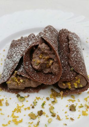 Una foto de Cannoli siciliano al cacao