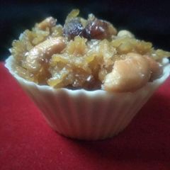 A picture of Jaggery rice in white chocolate tart.