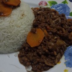 A picture of Braised rice with western beans stew.