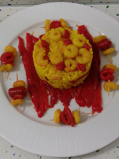 Una foto de Arroz con langostinos y pimientos