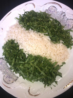 A picture of White rice with salad.