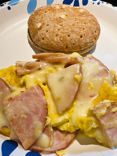 A picture of Eggs with Canadian Bacon.