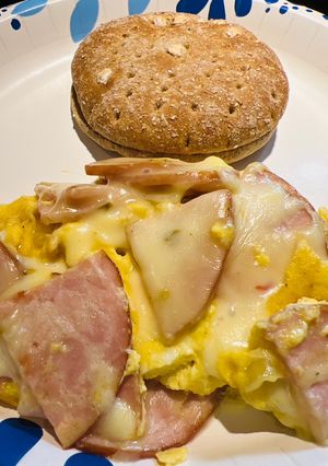 A picture of Eggs with Canadian Bacon.