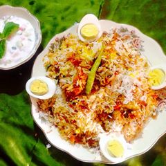 A picture of Hyderabadi Kacchi Murgh Dum Biryani.