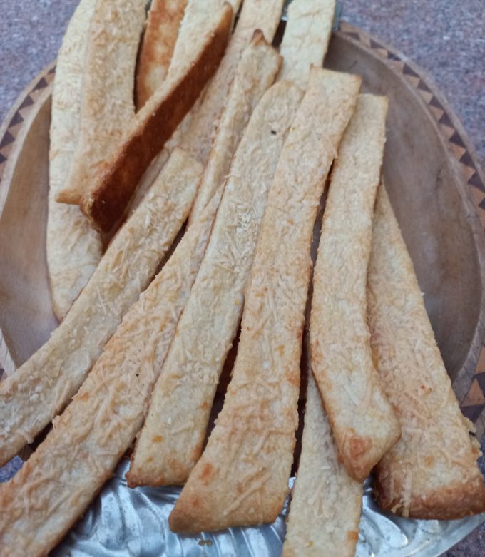 Una foto de Fajitas/Palitos de queso reggianito