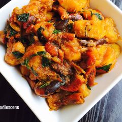 A picture of Ripe Plantain Porridge with Scent leafs.