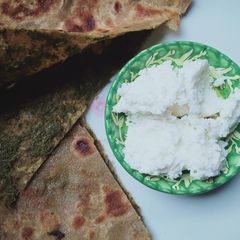 A picture of Saag fill paratha.
