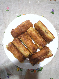 A picture of Bread, sausage, eggs toast.