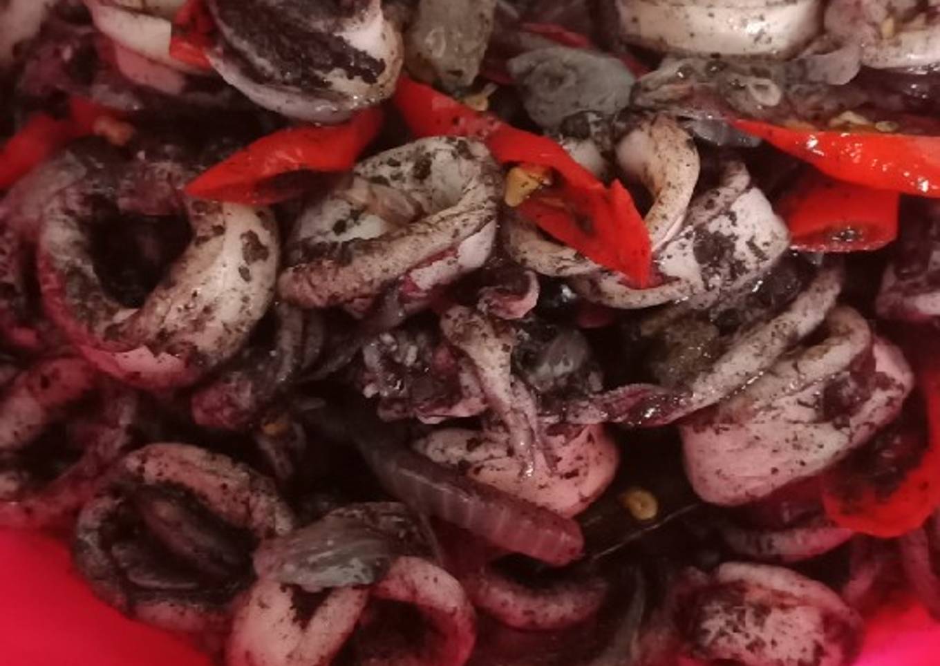 Томис Куми Хитам