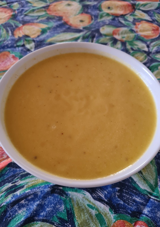 Una foto de Crema de calabacita naranja