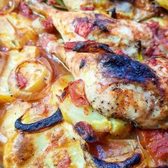 A picture of Baked potatoes and Chicken (Egyptian Style).