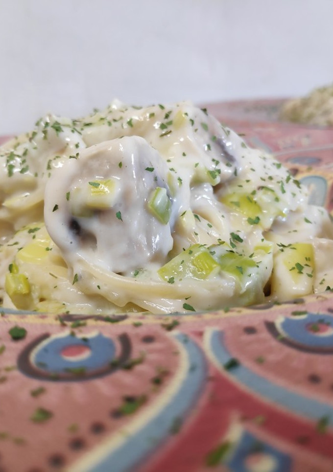 Una foto de Tallarines con champiñones a la crema