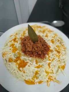 Una foto de Tamal en cazuela con picadillo de res 🍛