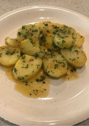 Una foto de Papas al pil pil