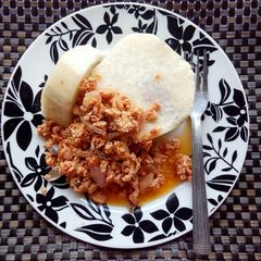 A picture of Boiled yam and egg sauce.
