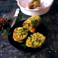 A picture of Methi with nuts - tadka suji glass dokla.