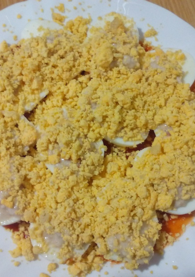 Una foto de Huevos rellenos con bechamel