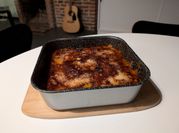 Una foto di parmigiana con besciamella