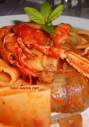 Foto di Calamarata con Scampi, Pomodorini e Carciofi