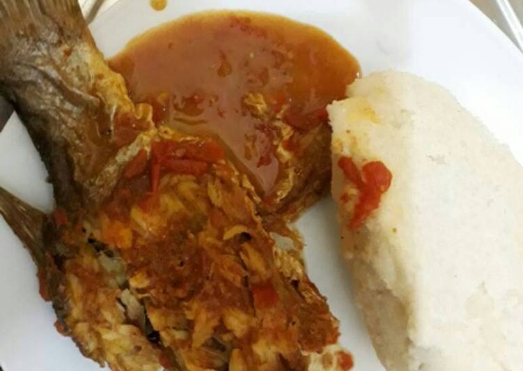Fish curry served with Ugali