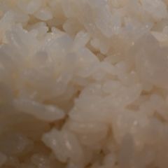 A picture of Cooking plain rice with non-stick pan.